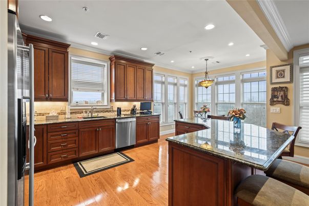 Dining room, Interior, Kitchen, Pendant Lights, Recessed Lighting, Stainless Steel Appliances, Wood Texture Flooring