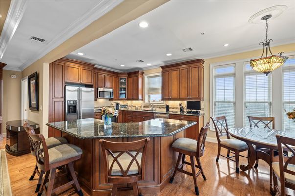 Dining room, Interior, Kitchen, Pendant Lights, Recessed Lighting, Stainless Steel Appliances, Wood Texture Flooring