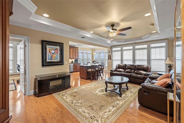 Dining room, Fireplace, Interior, Kitchen, Living room, Recessed Lighting, Wood Texture Flooring