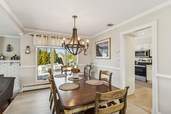 Chandelier, Dining room, Interior, Kitchen, Stainless Steel Appliances, Wood Texture Flooring