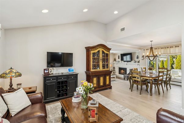 Chandelier, Dining room, Fireplace, Interior, Living room, Recessed Lighting, Wood Texture Flooring