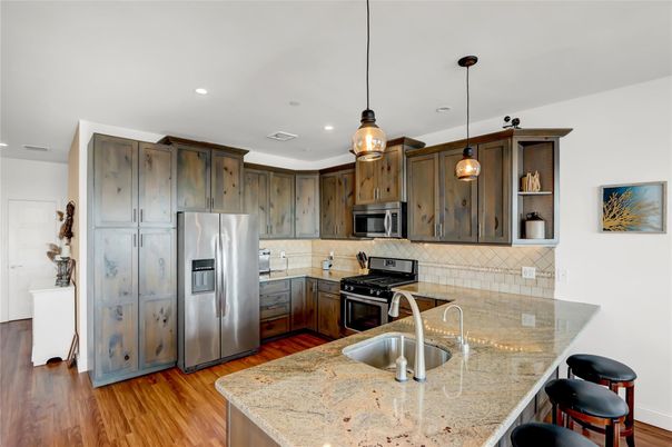 Interior, Kitchen, Pendant Lights, Recessed Lighting, Stainless Steel Appliances, Wood Texture Flooring