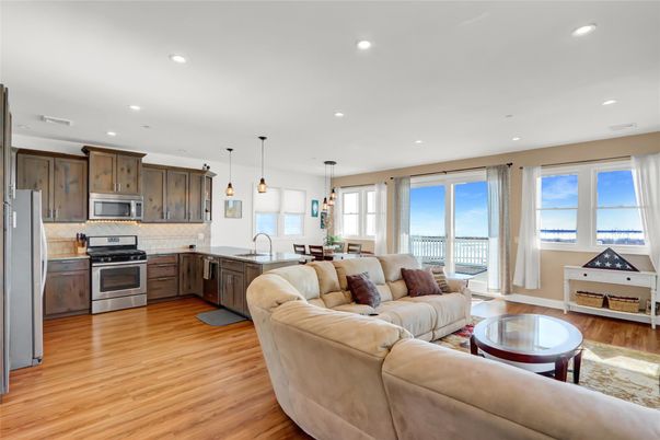 Dining room, Interior, Kitchen, Living room, Pendant Lights, Recessed Lighting, Stainless Steel Appliances, Wood Texture Flooring