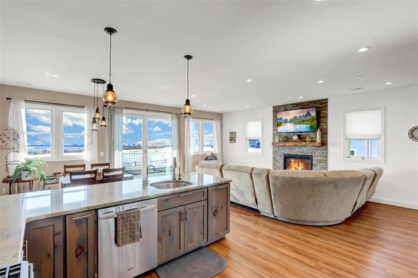 Dining room, Fireplace, Interior, Kitchen, Living room, Pendant Lights, Recessed Lighting, Wood Texture Flooring