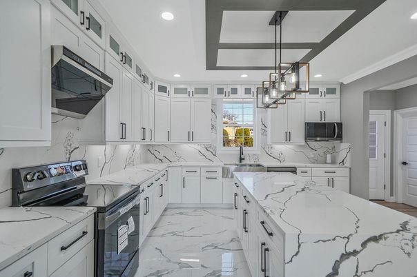 Interior, Kitchen, Marble, Marble Walls, Pendant Lights, Recessed Lighting, Stainless Steel Appliances