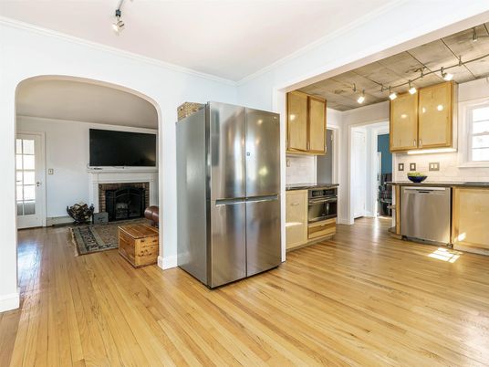 Fireplace, Interior, Kitchen, Stainless Steel Appliances, Wood Texture Flooring