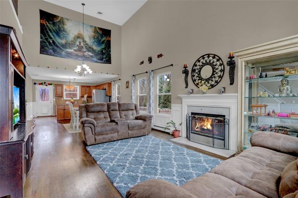Chandelier, Fireplace, Interior, Kitchen, Living room, Pendant Lights, Wood Texture Flooring