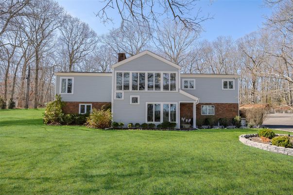 Exterior, Facade, Brick Facade, Raised Ranch