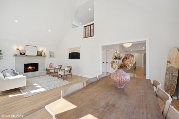 Dining room, Fireplace, Interior, Living room, Recessed Lighting, Wood Texture Flooring