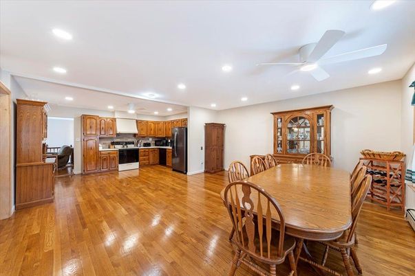Dining room, Interior, Kitchen, Recessed Lighting, Stainless Steel Appliances, Wood Texture Flooring