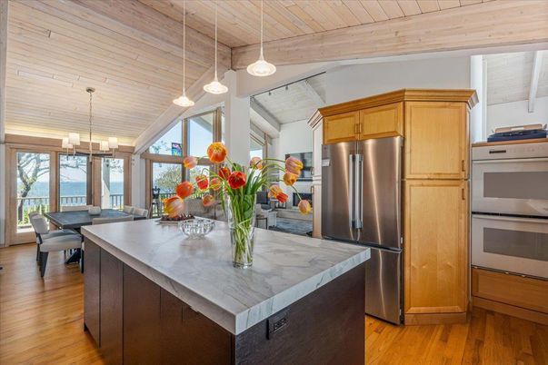 Dining room, Interior, Kitchen, Pendant Lights, Stainless Steel Appliances, Water, Wooden Ceilings, Wood Texture Flooring
