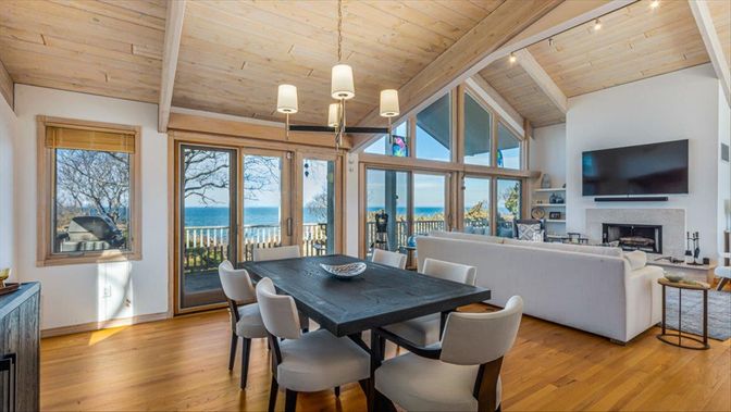 Dining room, Fireplace, Interior, Living room, Pendant Lights, Water, Wooden Beams, Wooden Ceilings, Wood Texture Flooring