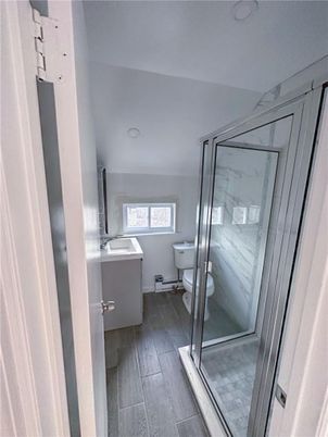 Bathroom, Glass Shower, Interior, Marble Walls, Wood Texture Flooring