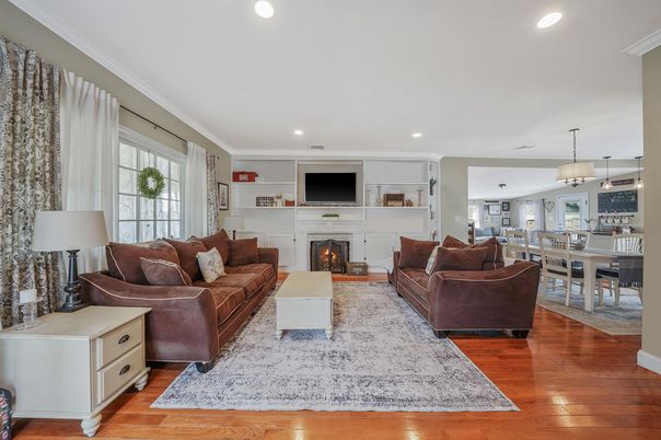 Dining room, Fireplace, Interior, Living room, Pendant Lights, Recessed Lighting, Wood Texture Flooring