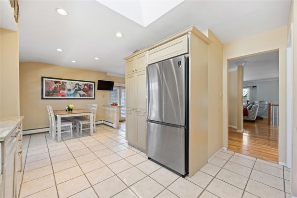 Dining room, Interior, Kitchen, Recessed Lighting, Stainless Steel Appliances, Wood Texture Flooring