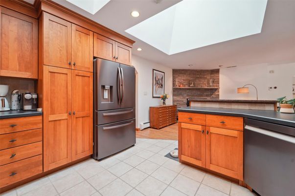 Interior, Kitchen, Recessed Lighting, Stainless Steel Appliances, Stone Walls, Wood Texture Flooring