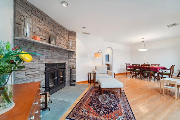 Dining room, Fireplace, Interior, Pendant Lights, Stone Walls, Wood Texture Flooring
