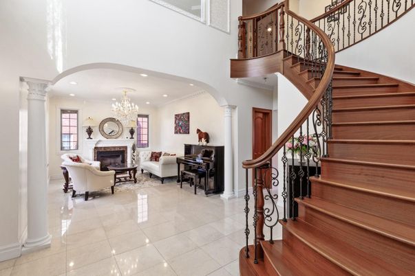 Chandelier, Fireplace, Interior, Living room, Piano, Recessed Lighting