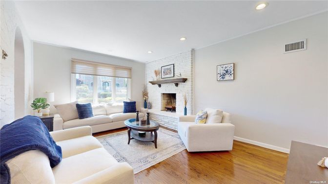 Fireplace, Interior, Living room, Recessed Lighting, Stone Walls, Wood Texture Flooring