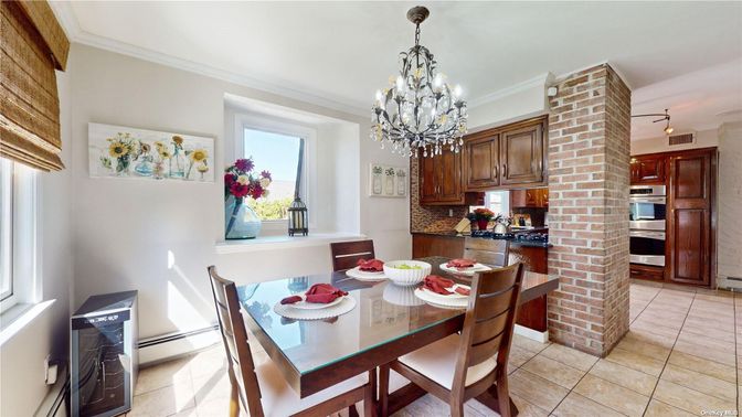 Chandelier, Dining room, Interior, Kitchen, Stainless Steel Appliances, Stone Walls