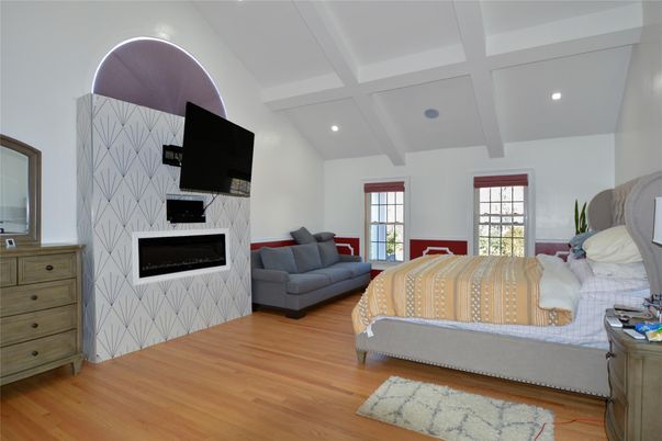 Bedroom, Fireplace, Interior, Recessed Lighting, Wood Texture Flooring