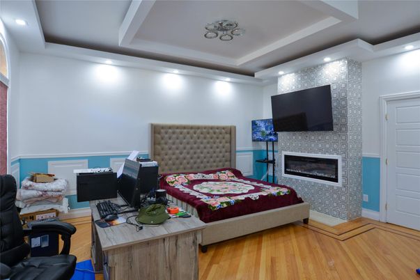 Bedroom, Fireplace, Interior, Recessed Lighting, Wood Texture Flooring