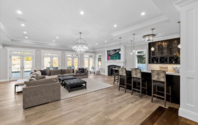 Chandelier, Fireplace, Interior, Living room, Pendant Lights, Recessed Lighting, Wood Texture Flooring