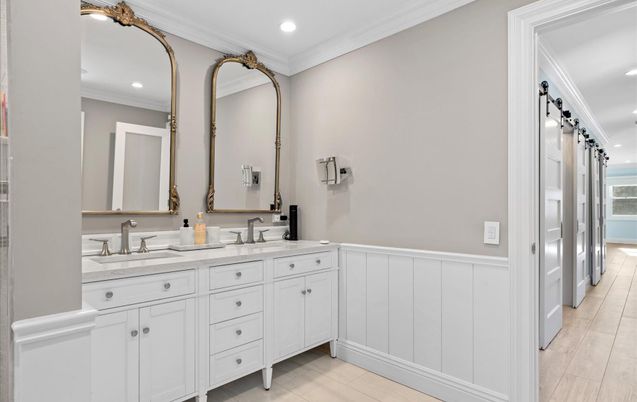 Bathroom, Dual Sink Vanities, Interior, Recessed Lighting, Wood Texture Flooring