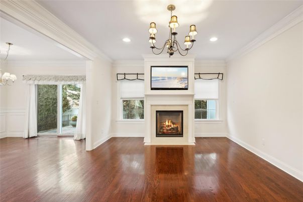 Chandelier, Empty room, Fireplace, Interior, Recessed Lighting, Wood Texture Flooring