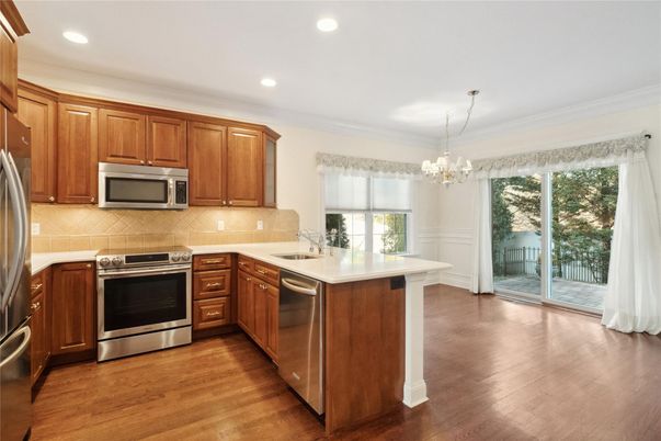 Chandelier, Interior, Kitchen, Recessed Lighting, Stainless Steel Appliances, Wood Texture Flooring