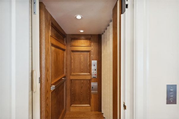 Elevator, Interior, Recessed Lighting, Wood Texture Flooring, Wooden Walls
