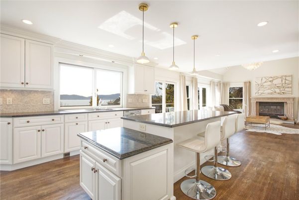 Chandelier, Fireplace, Interior, Kitchen, Living room, Pendant Lights, Recessed Lighting, Wood Texture Flooring
