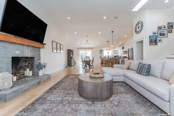 Dining room, Fireplace, Interior, Kitchen, Living room, Pendant Lights, Recessed Lighting, Stainless Steel Appliances, Wood Texture Flooring