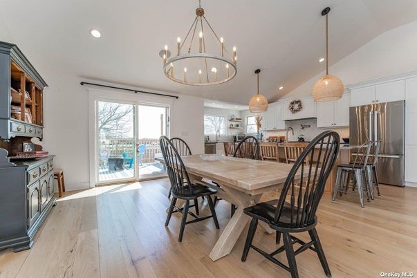 Chandelier, Dining room, Interior, Kitchen, Pendant Lights, Recessed Lighting, Stainless Steel Appliances, Wood Texture Flooring