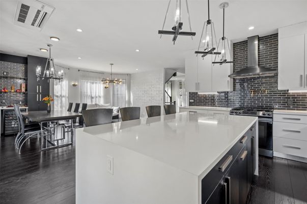 Chandelier, Dining room, Interior, Kitchen, Pendant Lights, Recessed Lighting, Stainless Steel Appliances, Wood Texture Flooring