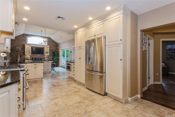Interior, Kitchen, Recessed Lighting, Stainless Steel Appliances, Stone Walls, Wood Texture Flooring
