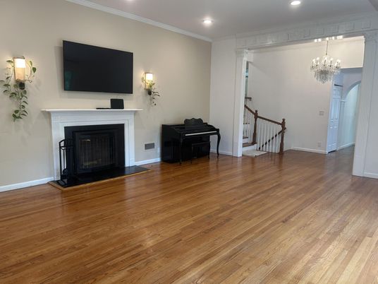 Chandelier, Fireplace, Interior, Piano, Recessed Lighting, Wood Texture Flooring