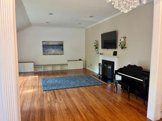 Chandelier, Fireplace, Interior, Piano, Recessed Lighting, Wood Texture Flooring