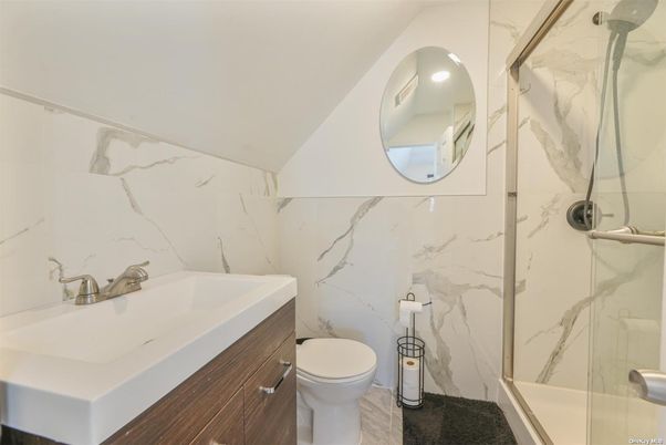 Bathroom, Glass Shower, Interior, Marble Walls, Recessed Lighting, Wood Texture Flooring
