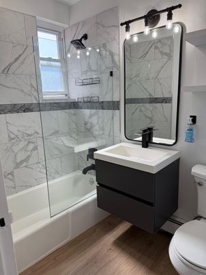 Bathroom, Glass Shower, Interior, Marble Walls, Wood Texture Flooring