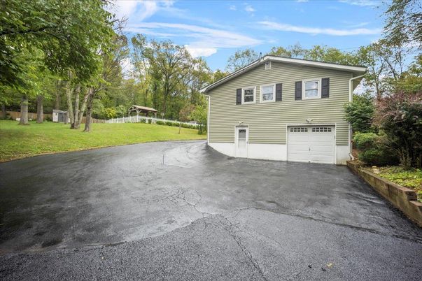 Attached, Backyard, Exterior, Facade, Split Level