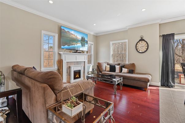 Fireplace, Interior, Living room, Recessed Lighting, Wood Texture Flooring