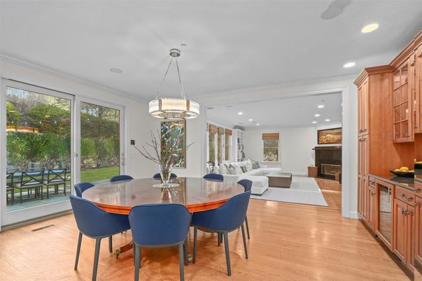 Dining room, Fireplace, Interior, Living room, Pendant Lights, Recessed Lighting, Wood Texture Flooring