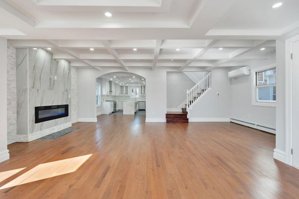 Empty room, Fireplace, Interior, Kitchen, Recessed Lighting, Wood Texture Flooring