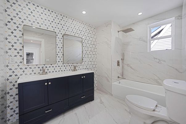 Bathroom, Dual Sink Vanities, Interior, Marble, Marble Walls, Recessed Lighting