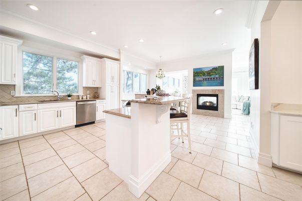Chandelier, Dining room, Fireplace, Interior, Kitchen, Recessed Lighting, Stainless Steel Appliances