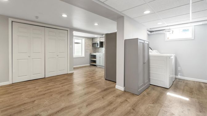 Interior, Kitchen, Recessed Lighting, Washer, Wood Texture Flooring