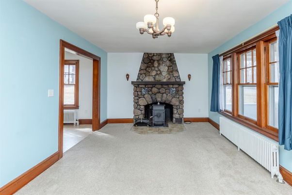 Chandelier, Empty room, Fireplace, Interior