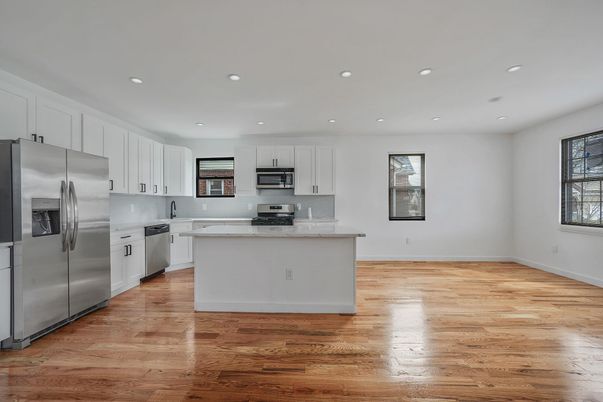 Interior, Kitchen, Recessed Lighting, Stainless Steel Appliances, Wood Texture Flooring