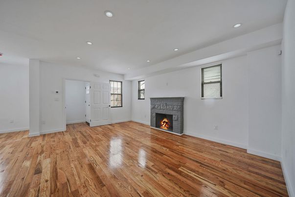 Empty room, Fireplace, Interior, Recessed Lighting, Wood Texture Flooring